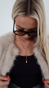 The Lany Necklace: water resistant, adjustable 16-18 inches, lifetime warranty; gold bead chain with teardrop pendant.